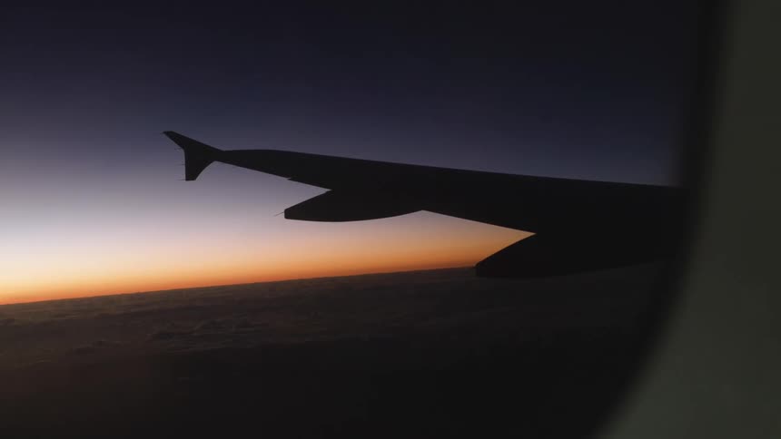 Sharp boundary between the dark deep purple sky and the vibrant orange glow of the rising or setting sun this line sits higher up and represents the upper edge of the atmospheric light