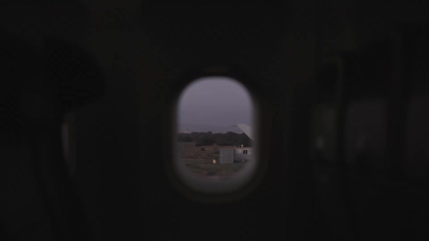 Plane taking off seen through the front window