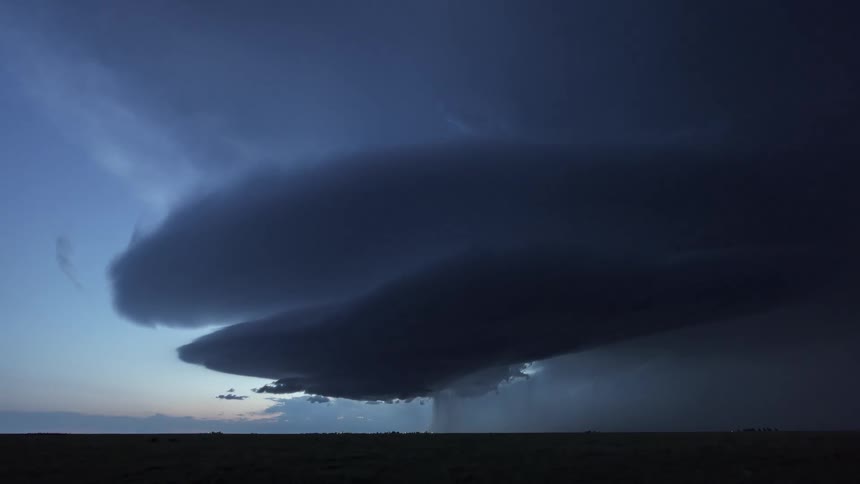 Landscape in an open field during an intense storm