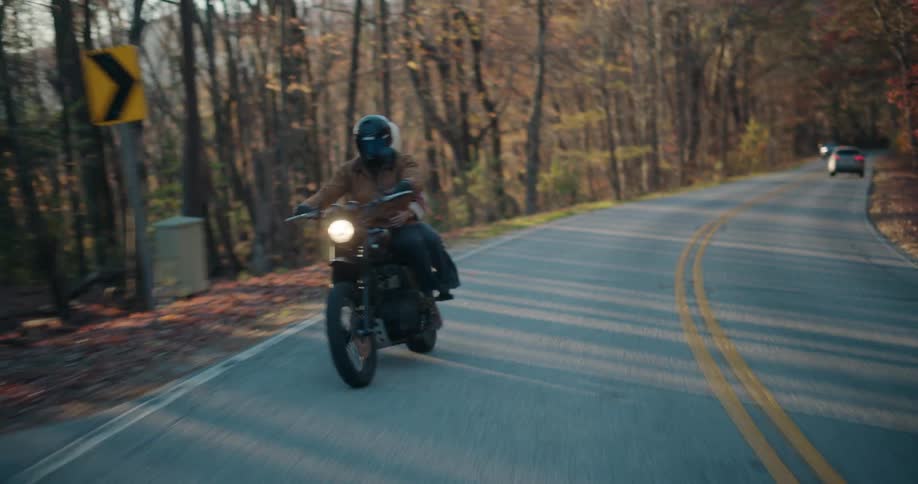 The motorcycle turns off the exit on the highway