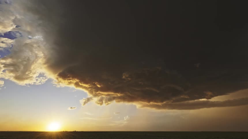Super cell storm moves in rotation over rural land