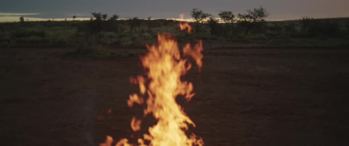 Slow motion of a fire burning outdoors