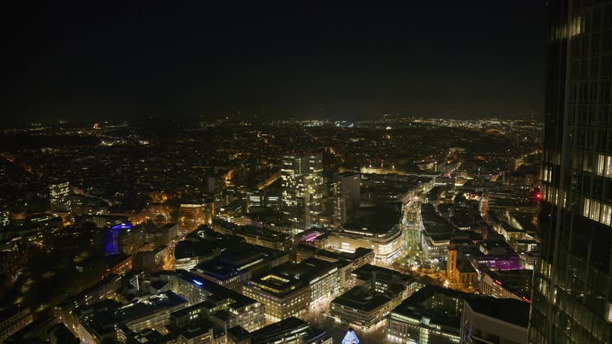 A view of some buildings in a city at night