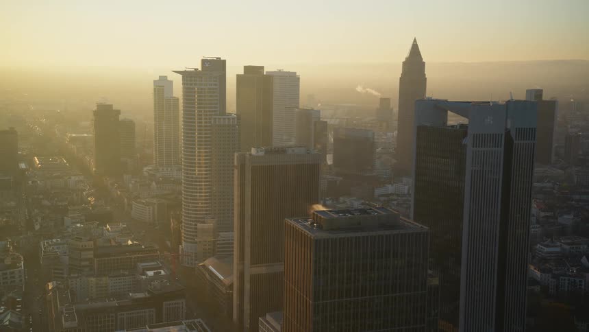 The sun shines over a city