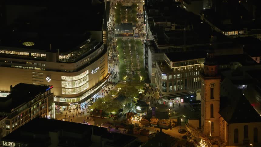 City intersection with illuminated pedestrian crossings at night