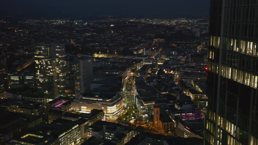 Panorama of illuminated buildings at night in a metropolis