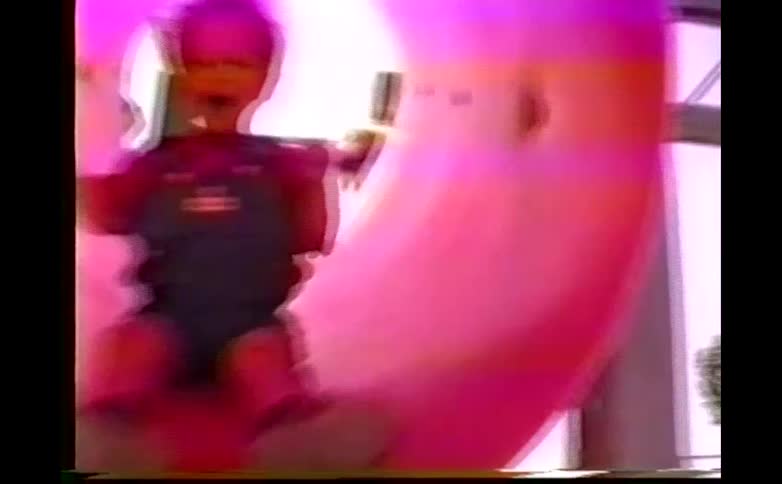 The child slides down the tube in the playground