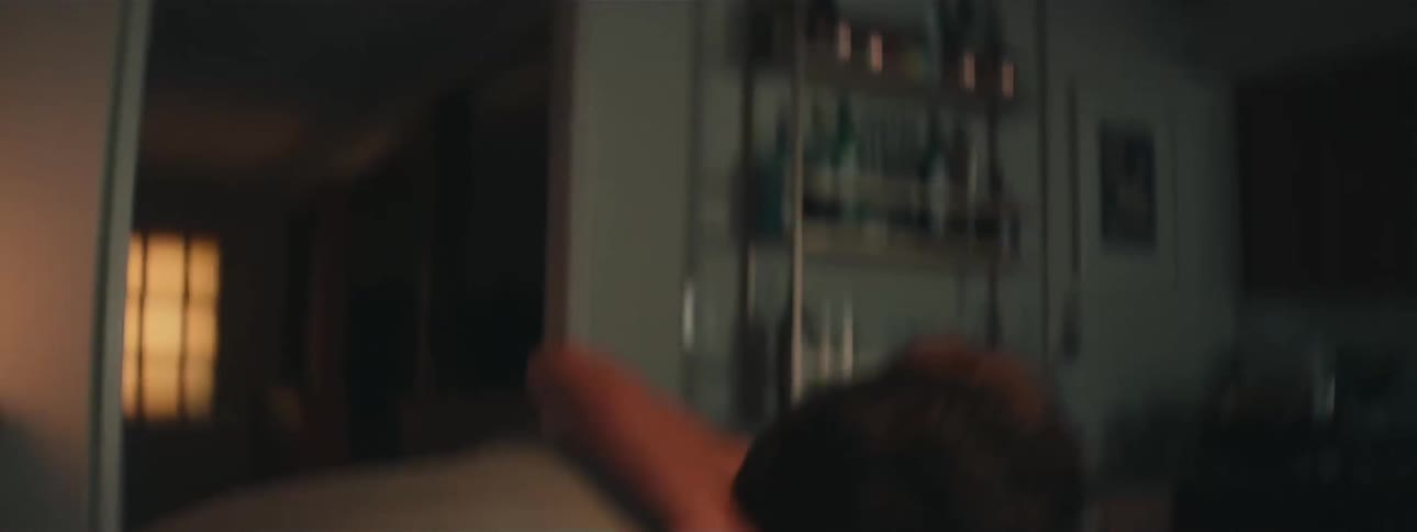 The father picks up his daughter from the table