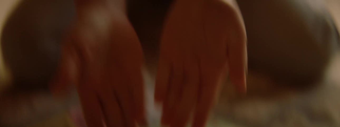 Little girl playing dice on a game board