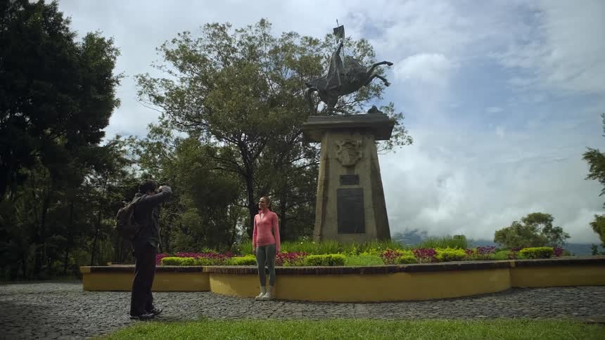 A man taking photos of a woman