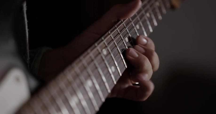 The guitar is being played very fast