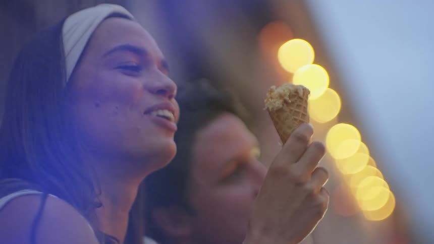 A man and woman having some ice cream