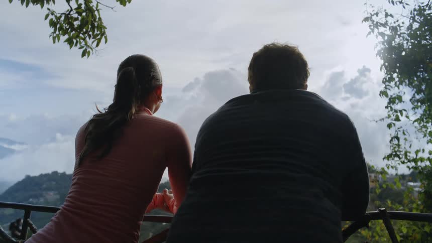 A man and a woman outside
