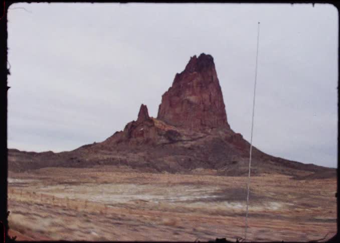 A view of a rock mountain in a desert area