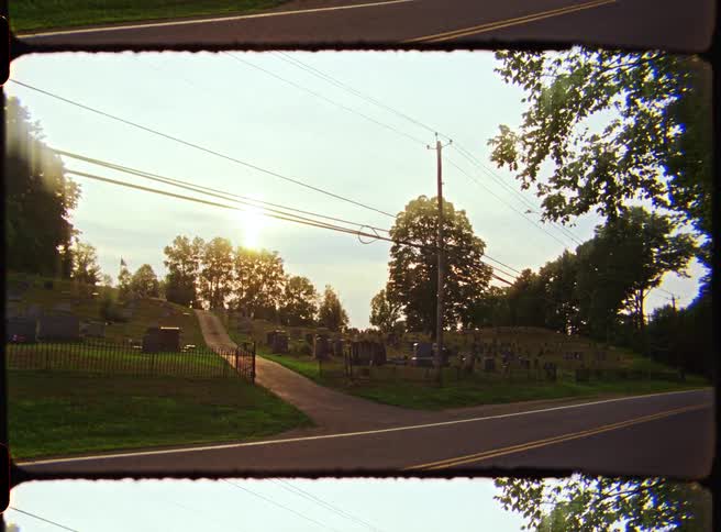 A view of a driveway in a suburban area