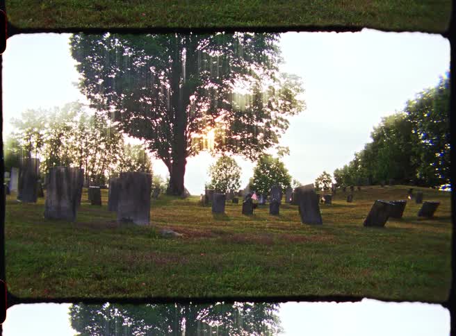 A view of a cemetery with gravestones