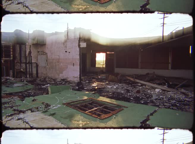 The building is destroyed with its ceiling and walls caved in