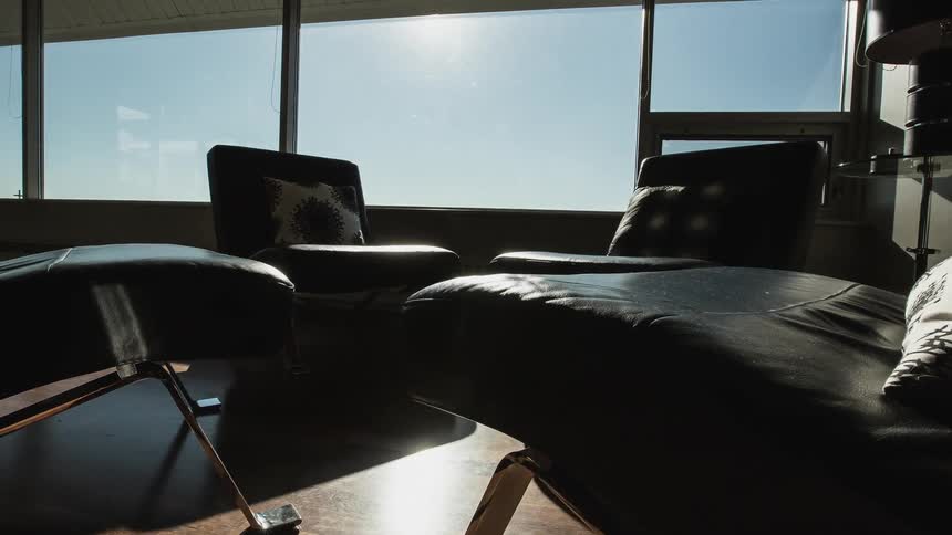 The room is empty besides furniture