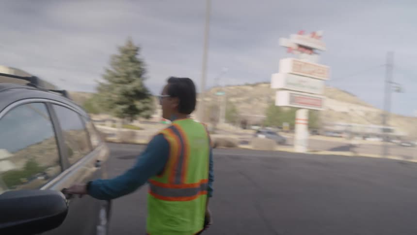 Man getting into a car