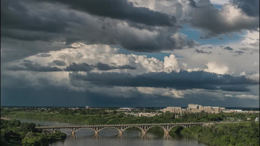 The clouds slowly pass over the bridge