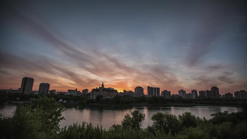 The sun is setting over the city