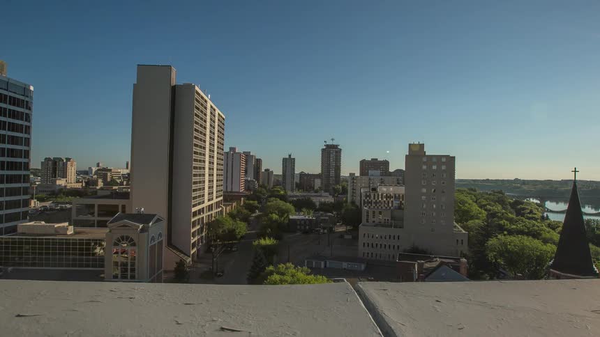 Buildings sit in the city on a clear day