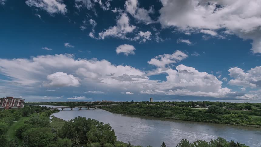 The large clouds begin to move over the bridge