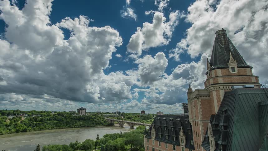 Clouds move over a small bridge