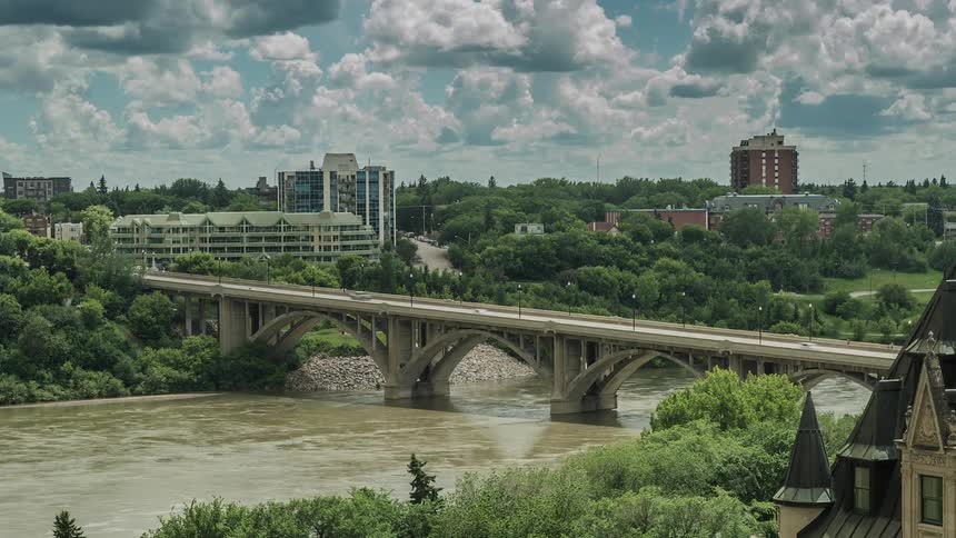The cars pass over the bridge fast in this time lapse