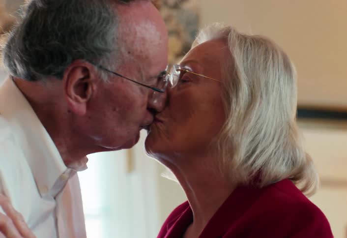 The man and woman kiss