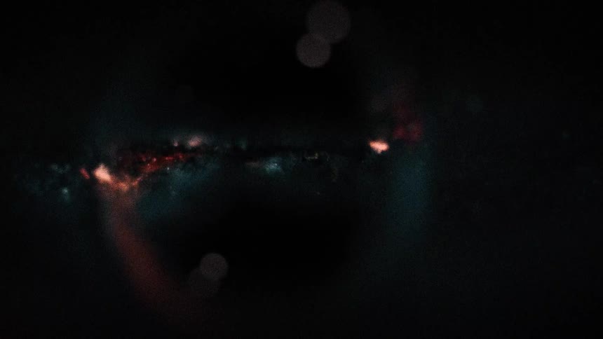 Deep in space as the dark atmosphare is illuminated by red ligt
