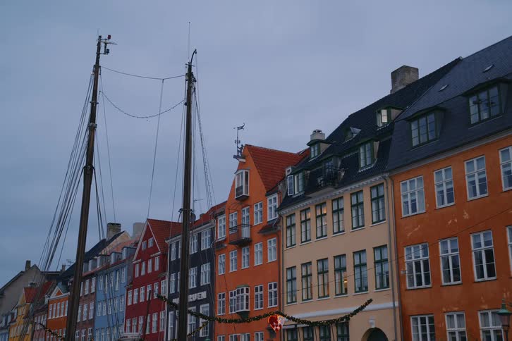 A view of some houses all in a row outdoors