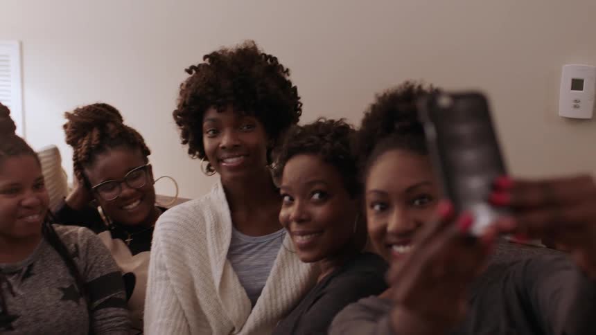 A group of people take a selfie