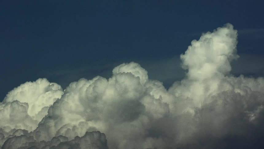 The clouds flow across the sky
