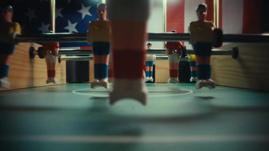 A view of toys on a foosball table