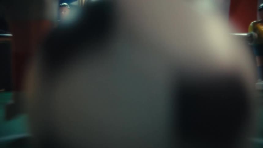 The camera hitting the ball on a foosball table