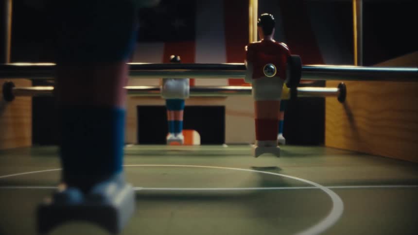 Closeup of a foosball table in an interior space