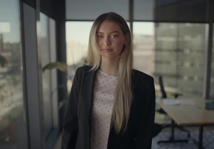 A portrait of a woman in a room