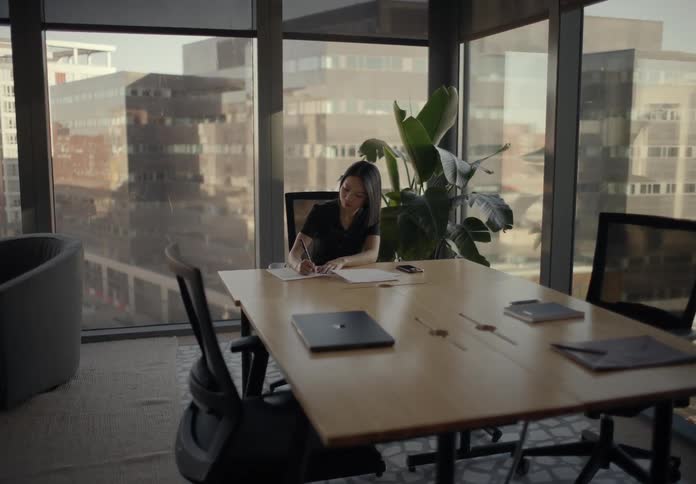 A woman working in an office
