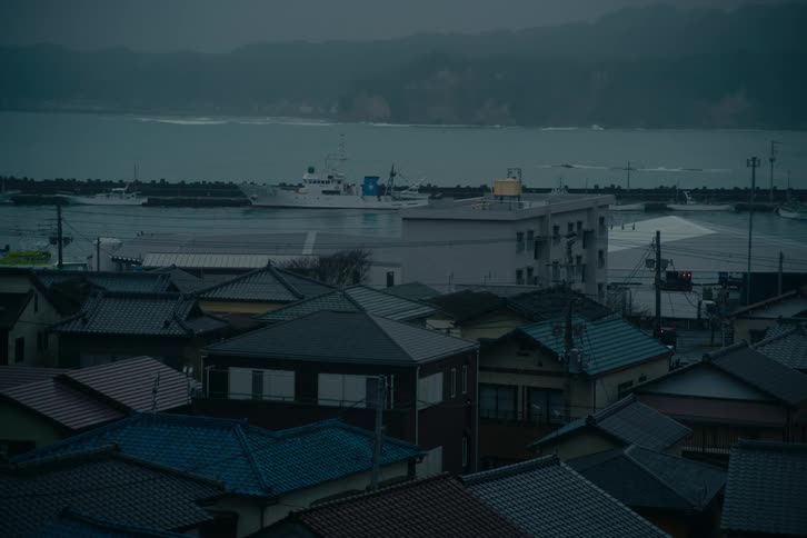 A view of some buildings out near water