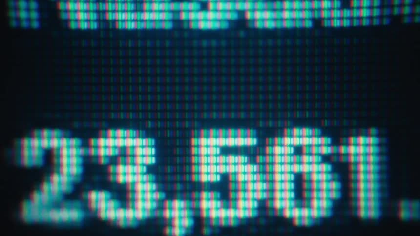 The monitor has a line graph and numbers
