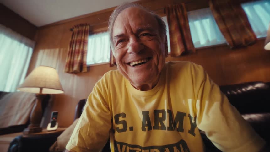 Elderly gentleman smiling with a happy expression