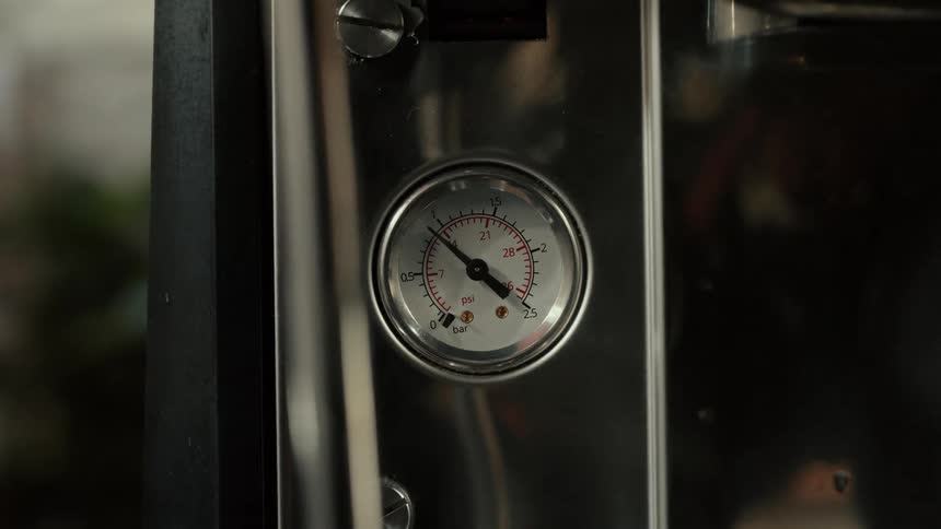 Steam rises as the machine is working