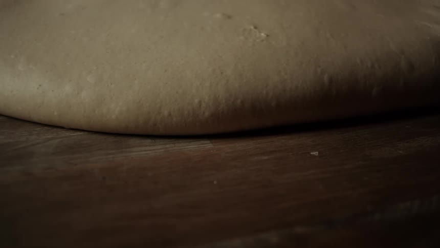 A large mound of wood is spreading