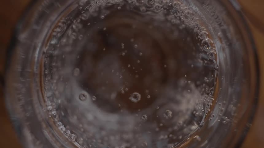 Carbonated drink being poured into a glass