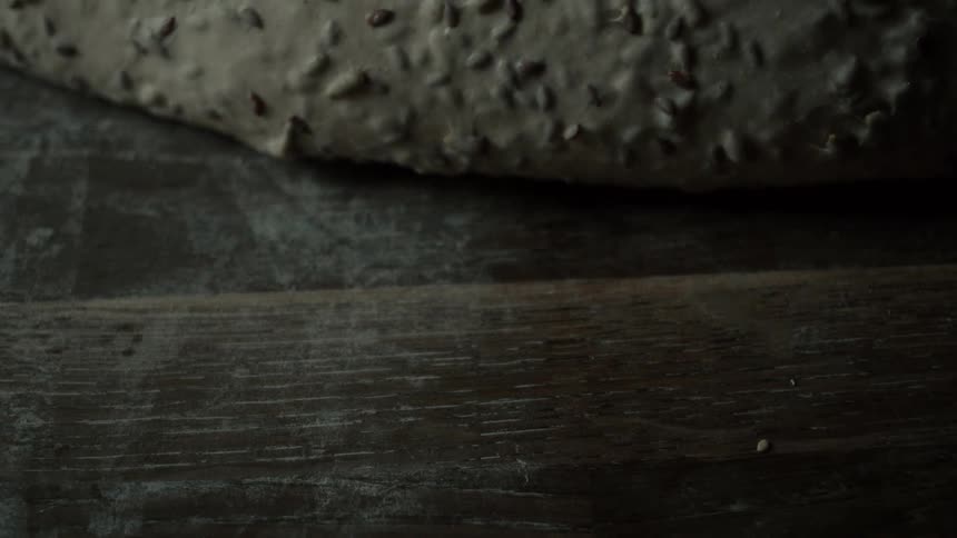 The dough is rolling and spreading on the table