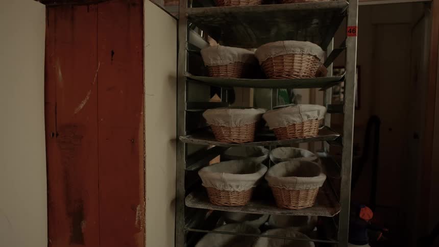 The shelves are full of wicker baskets