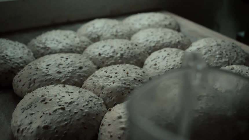 A view of some loaves of bread in a tray