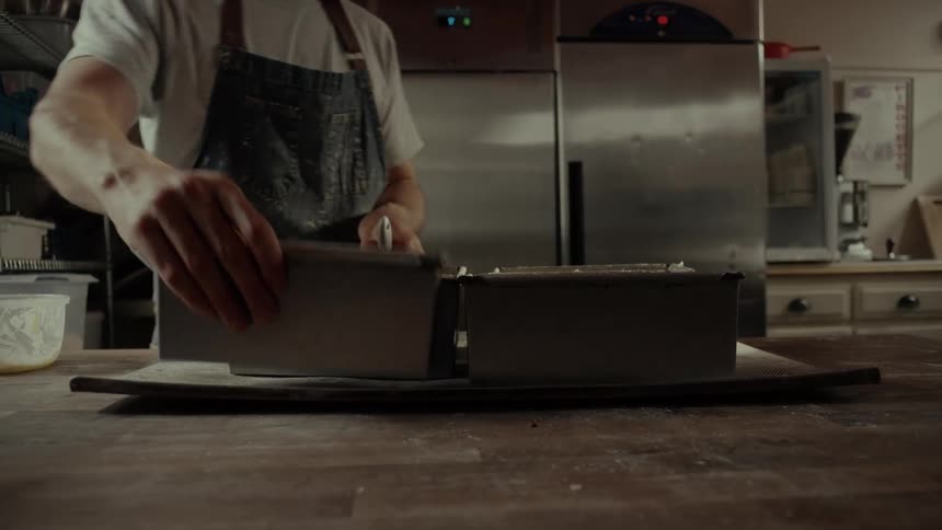 A man making food in a kitchen