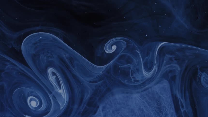 Stick passing through a liquid leaves a curly ribbon of paint to blend with the liquid